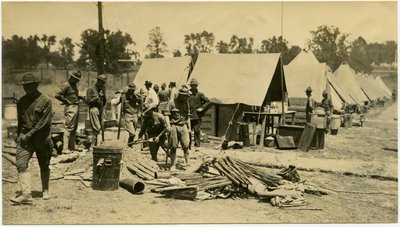 Soldiers Working with Shovels in an Area at the End of a Row of Tents by Carl Michel